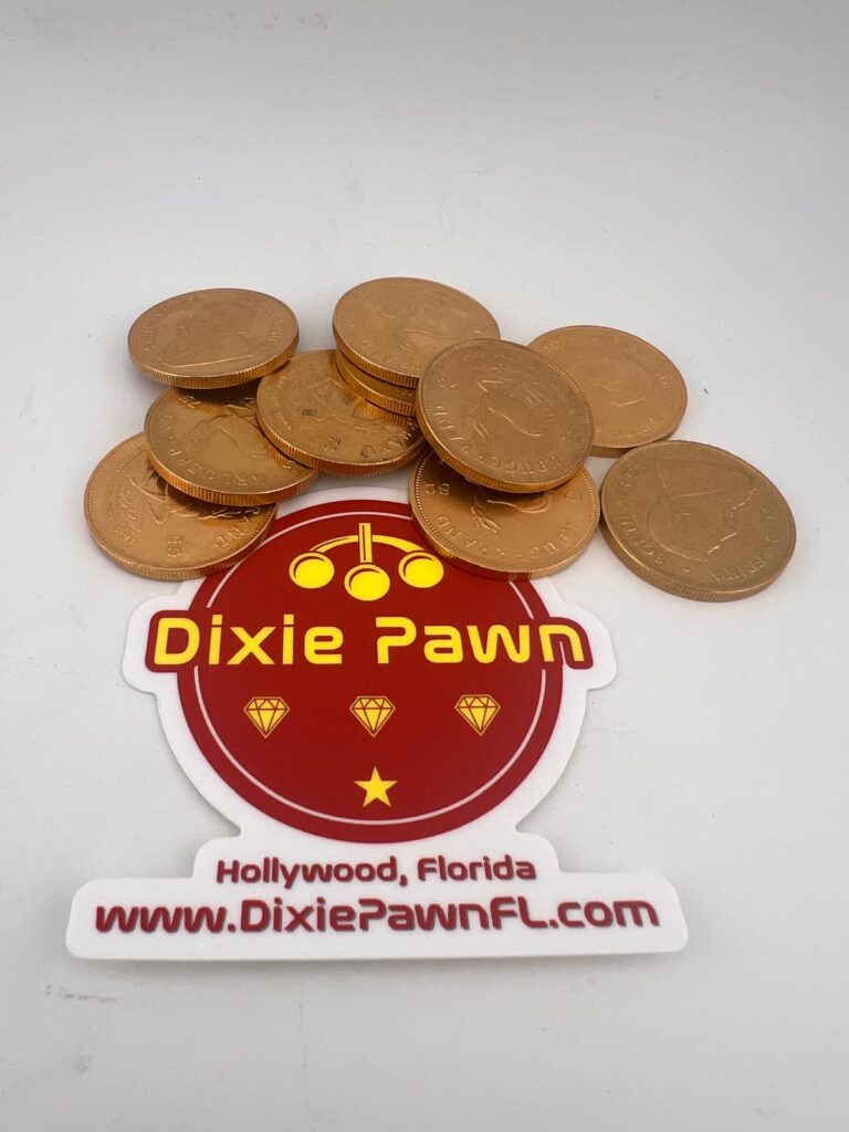 Pile of Krugerrands Gold Coins from South Africa and Dixie Pawn logo.