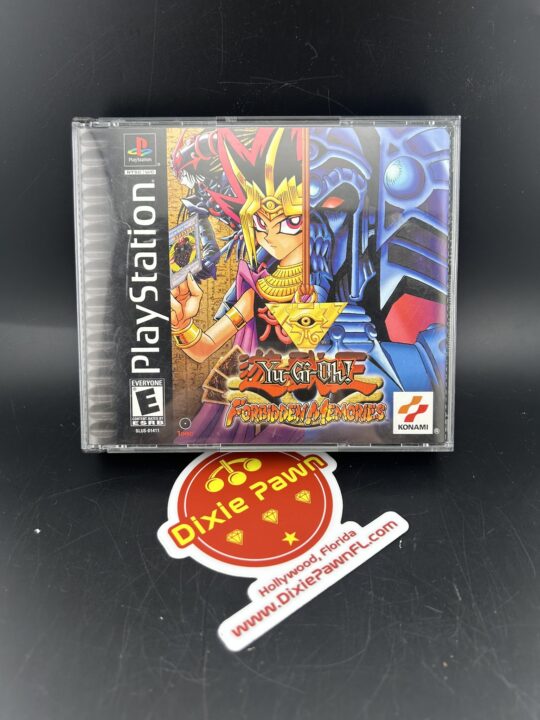 Yu-Gi-Oh! Forbidden Memories PlayStation 1 game in original jewel case displayed with a Dixie Pawn sticker, showcasing vintage video game collectibles.