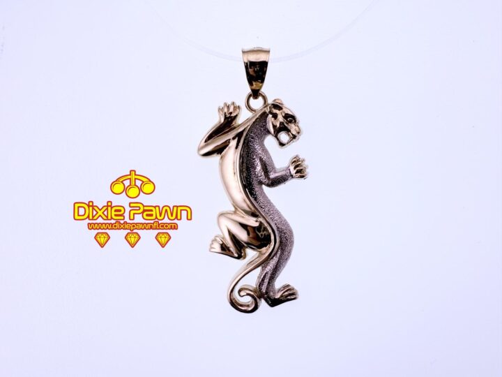 Solid gold panther pendant with intricate detailing, available at Dixie Pawn in Hollywood, FL. Bold and stylish jewelry piece for collectors and gold enthusiasts.