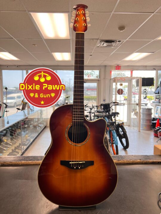 An Ovation 6-string acoustic-electric guitar, right-handed, with a vibrant two-color sunburst finish, perfect for versatile musicians.