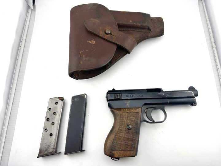 Kriegsmarine Mauser 1934 – WWII German Navy Pistol at Dixie Pawn - Dixie Pawn & Jewelry Rare Kriegsmarine Mauser 1934 4th Variation pistol with WWII French holster, available at Dixie Pawn in Hollywood, Florida